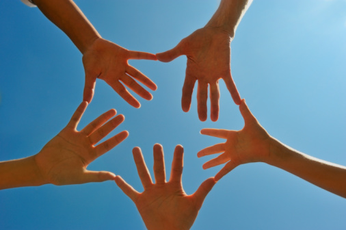 Hands in circle, palms upward, close-up